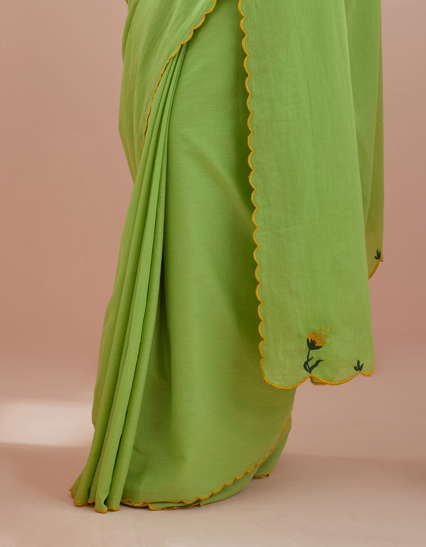 Green Cotton Saree with Green embroidery and Pinstripe Blouse