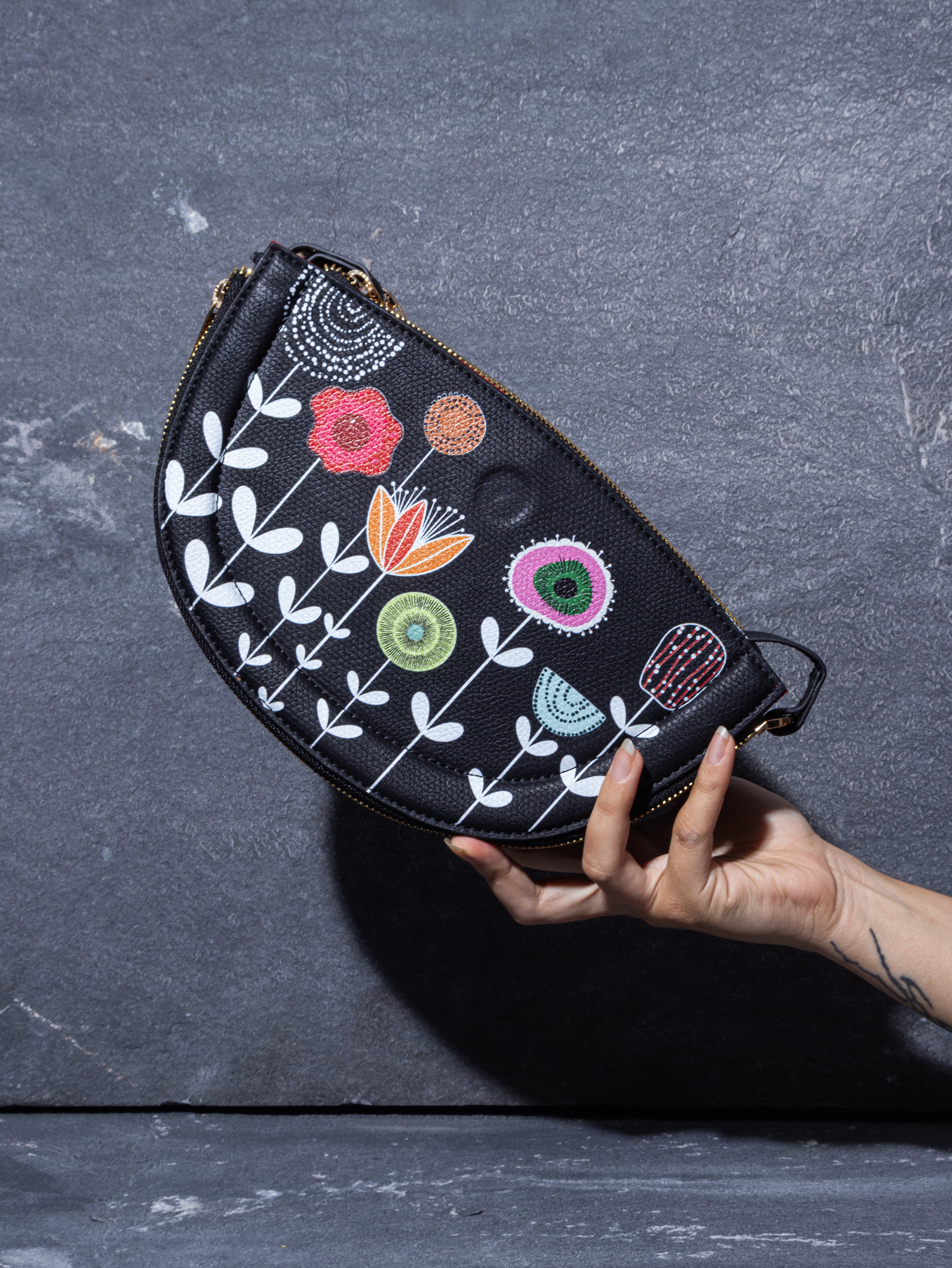 The Vana Half Moon Sling Bag